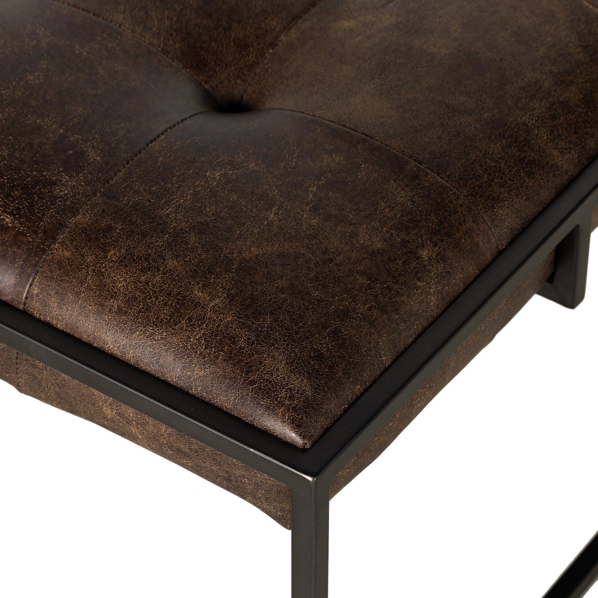 Oxford Square Coffee Table by Four Hands in rialto ebony, antique brass. Made from top grain leather, iron, 100% polyester in a modern style.