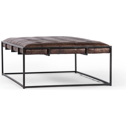 Oxford Coffee Table by Four Hands in rialto ebony and antique brass. Made from top grain leather, iron, 100% polyester in a modern style.