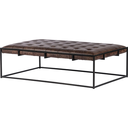 Oxford Coffee Table by Four Hands in rialto ebony and antique brass. Made from top grain leather, iron, 100% polyester in a modern style.