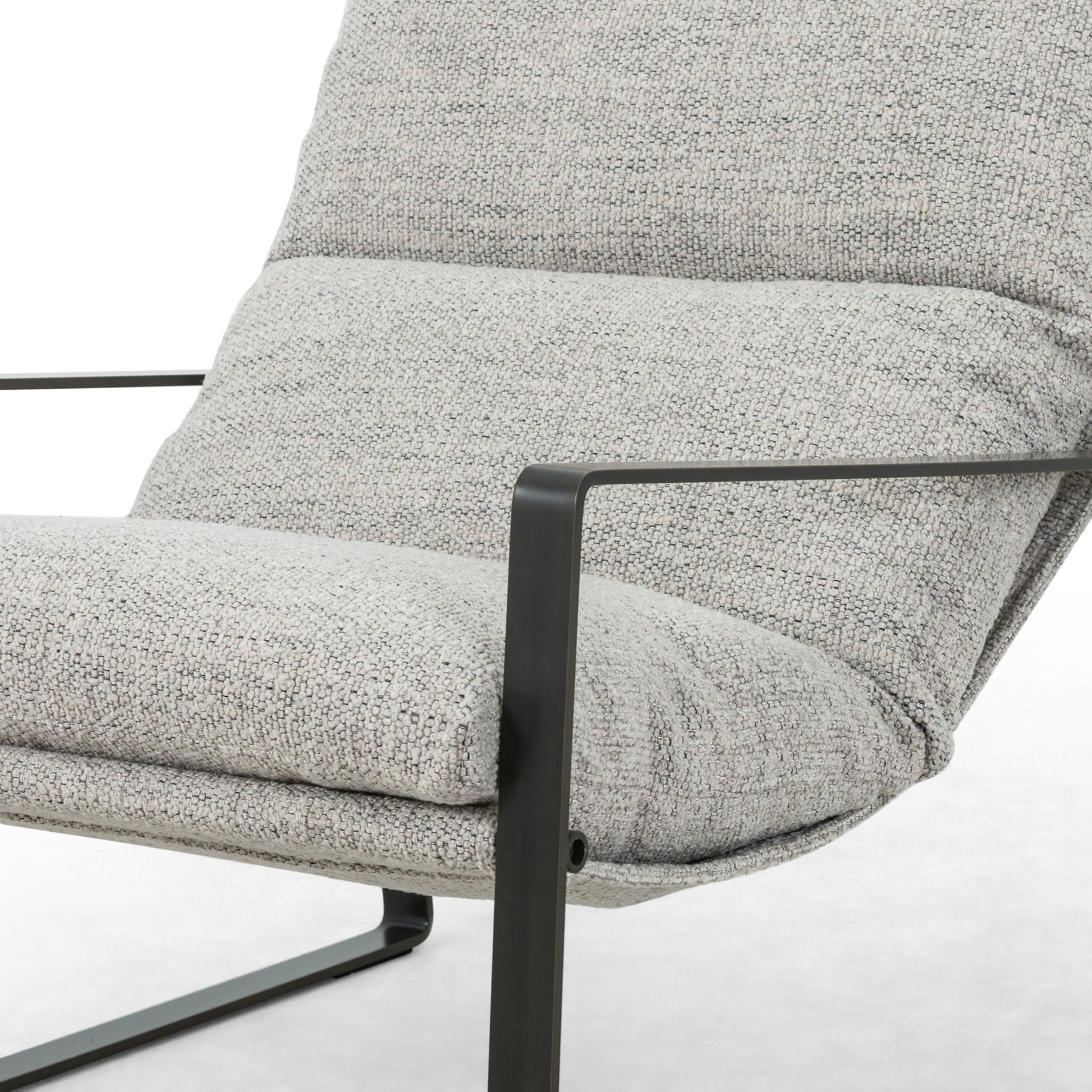 Emmett Sling Chair by Four Hands. Made from top grain leather, iron, 100% polyester in a modern style.
