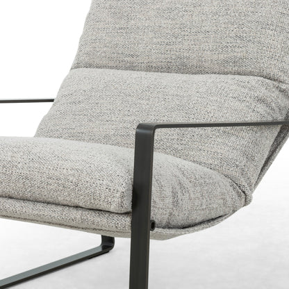 Emmett Sling Chair by Four Hands. Made from top grain leather, iron, 100% polyester in a modern style.