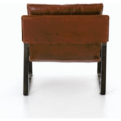 Emmett Sling Chair by Four Hands. Made from top grain leather, iron, 100% polyester in a modern style.