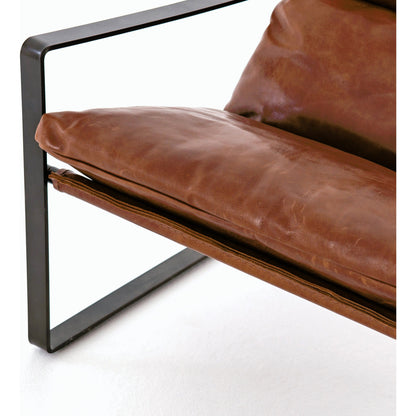 Emmett Sling Chair by Four Hands. Made from top grain leather, iron, 100% polyester in a modern style.