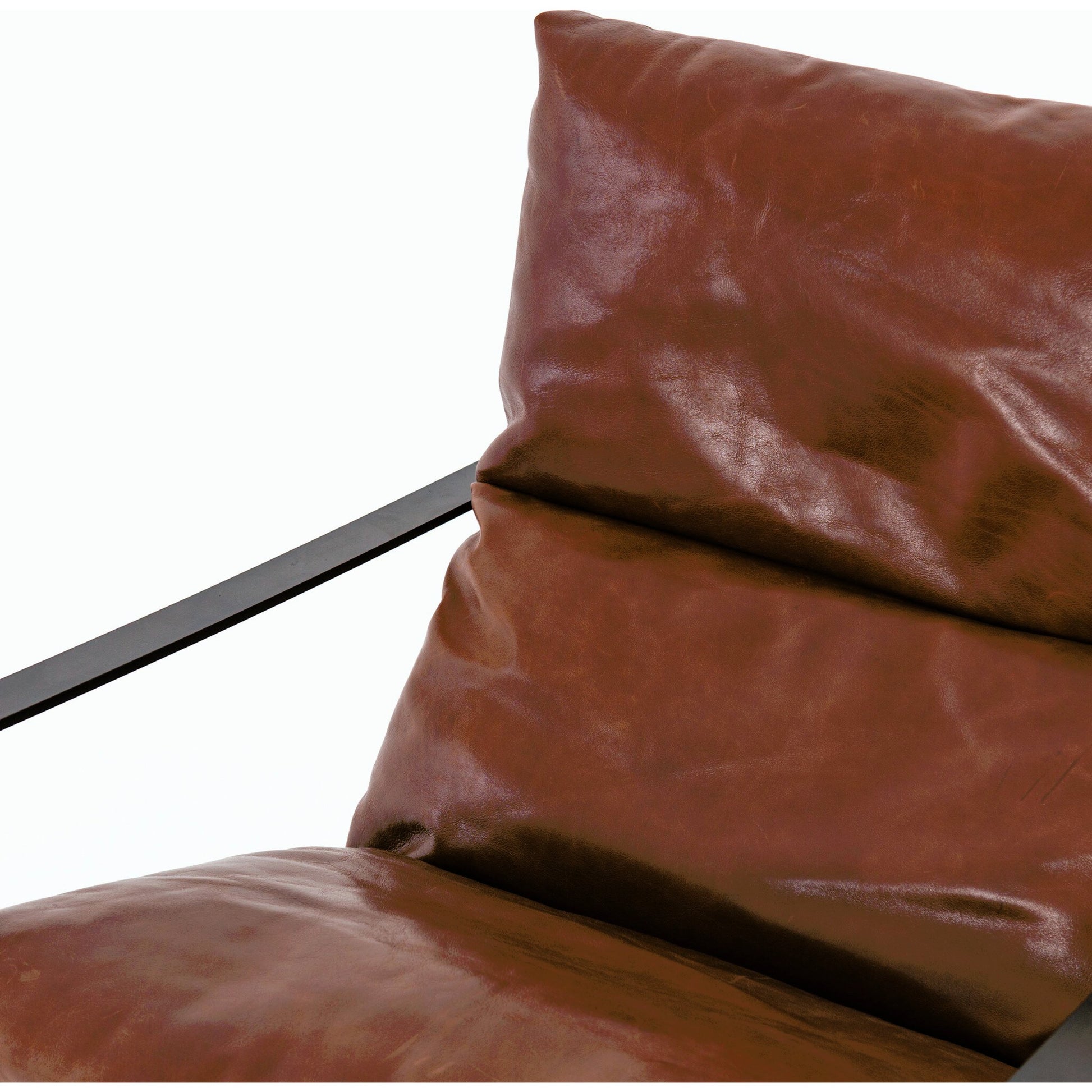 Emmett Sling Chair by Four Hands. Made from top grain leather, iron, 100% polyester in a modern style.