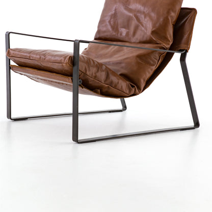 Emmett Sling Chair by Four Hands. Made from top grain leather, iron, 100% polyester in a modern style.