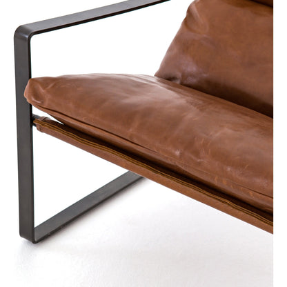 Emmett Sling Chair by Four Hands. Made from top grain leather, iron, 100% polyester in a modern style.