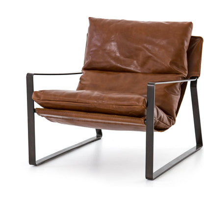 Emmett Sling Chair by Four Hands. Made from top grain leather, iron, 100% polyester in a modern style.