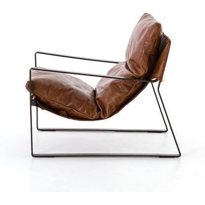 Emmett Sling Chair by Four Hands. Made from top grain leather, iron, 100% polyester in a modern style.