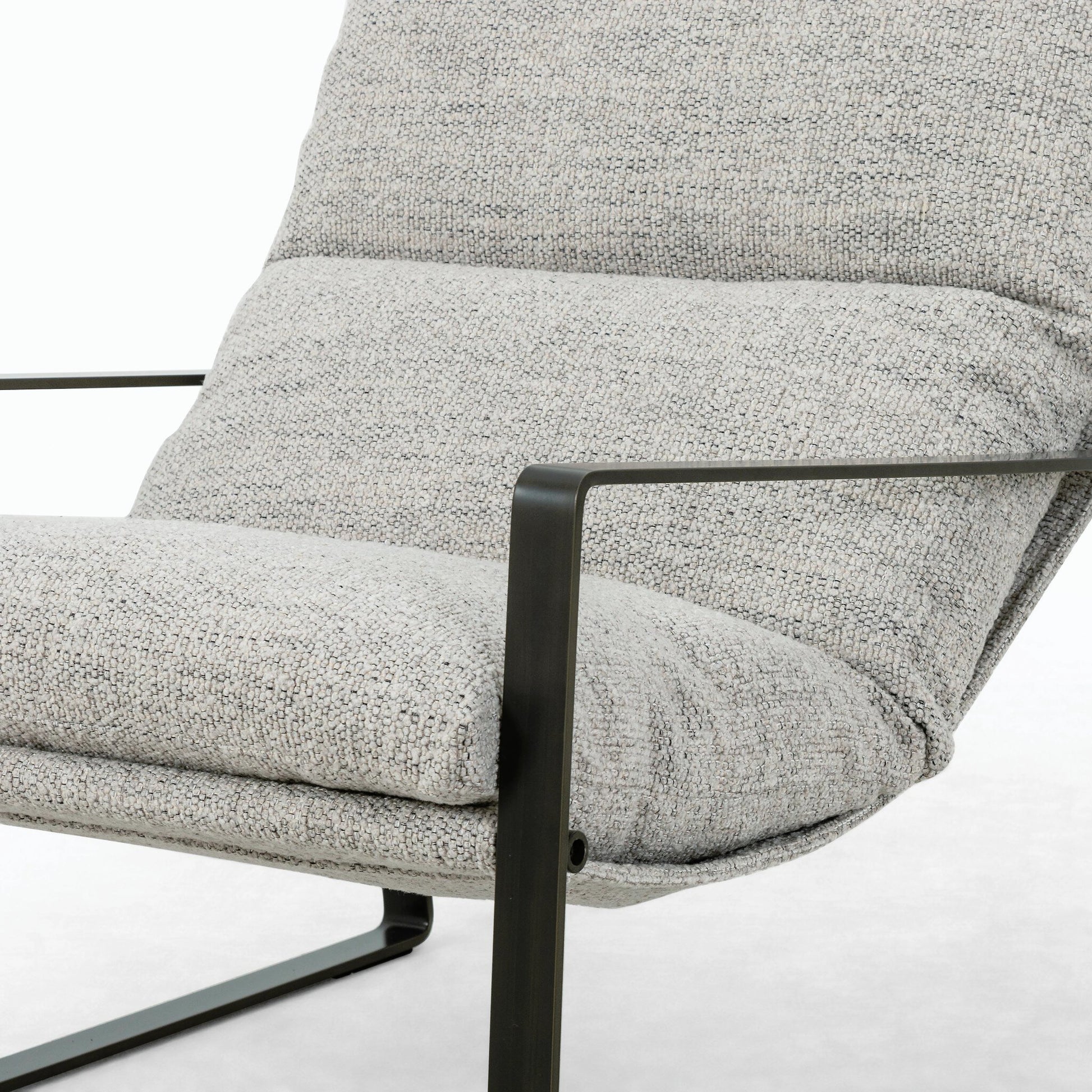 Emmett Sling Chair by Four Hands. Made from top grain leather, iron, 100% polyester in a modern style.