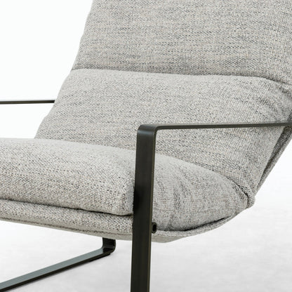 Emmett Sling Chair by Four Hands. Made from top grain leather, iron, 100% polyester in a modern style.
