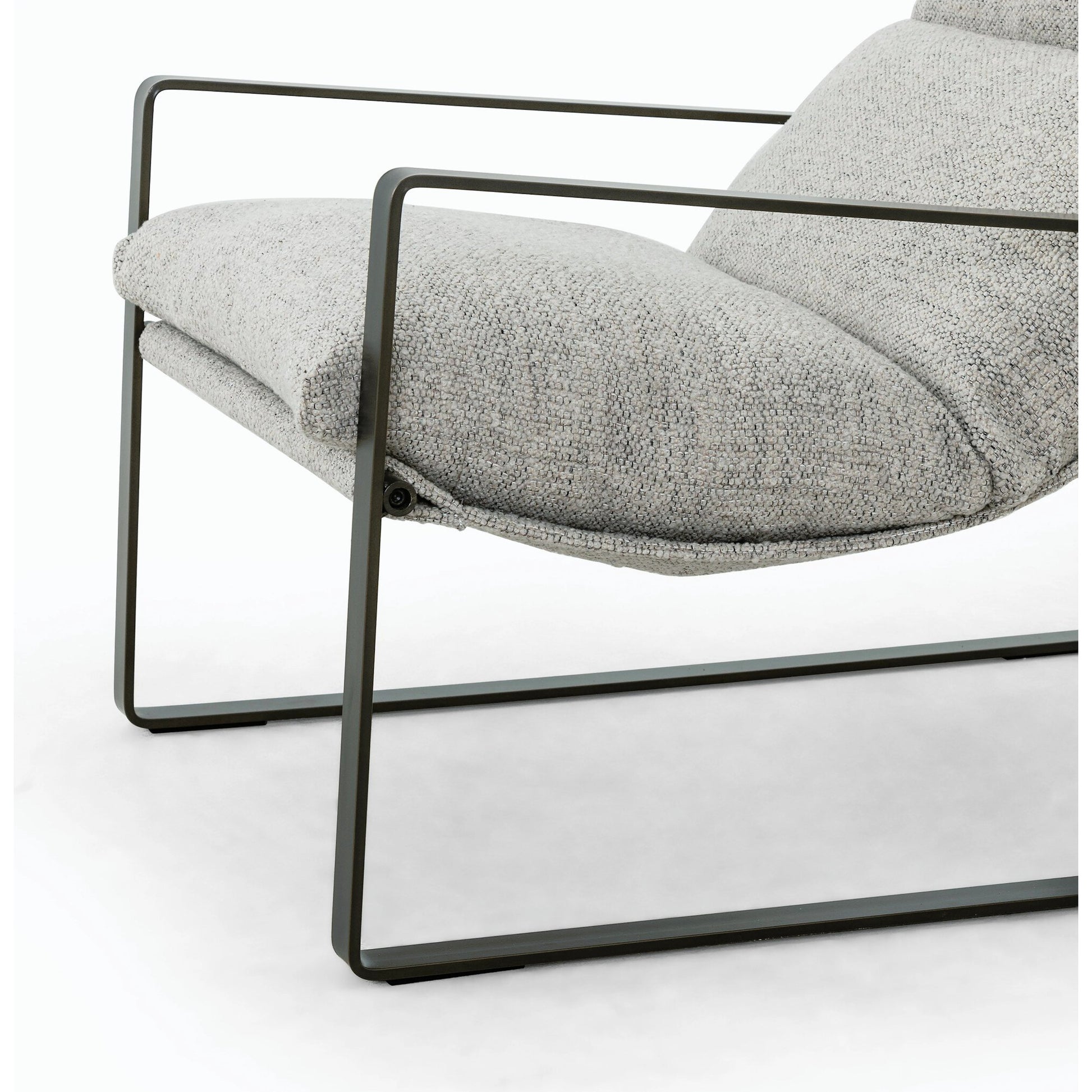 Emmett Sling Chair by Four Hands. Made from top grain leather, iron, 100% polyester in a modern style.