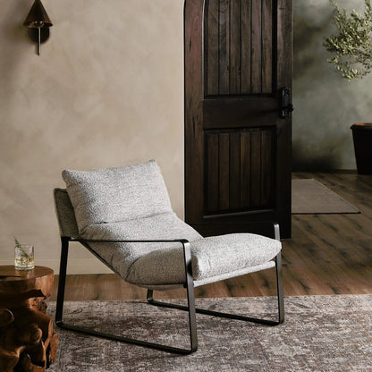 Emmett Sling Chair by Four Hands. Made from top grain leather, iron, 100% polyester in a modern style.