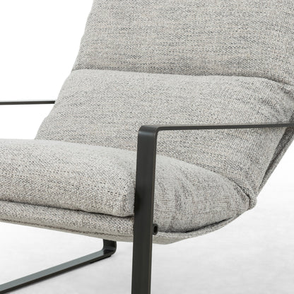 Emmett Sling Chair by Four Hands. Made from top grain leather, iron, 100% polyester in a modern style.
