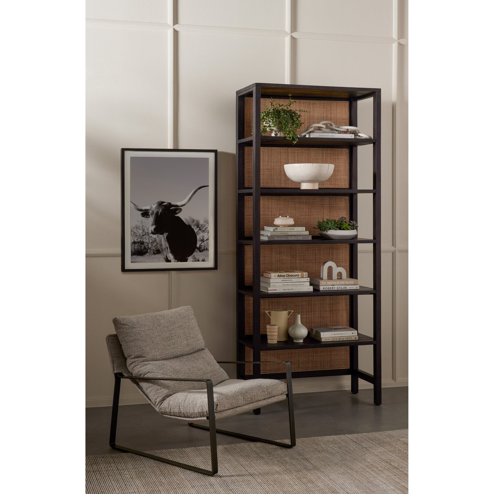 Emmett Sling Chair by Four Hands. Made from top grain leather, iron, 100% polyester in a modern style.