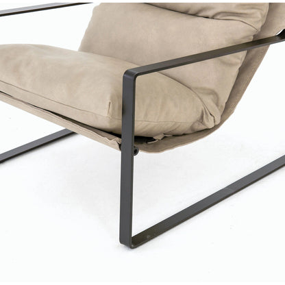 Emmett Sling Chair by Four Hands. Made from top grain leather, iron, 100% polyester in a modern style.