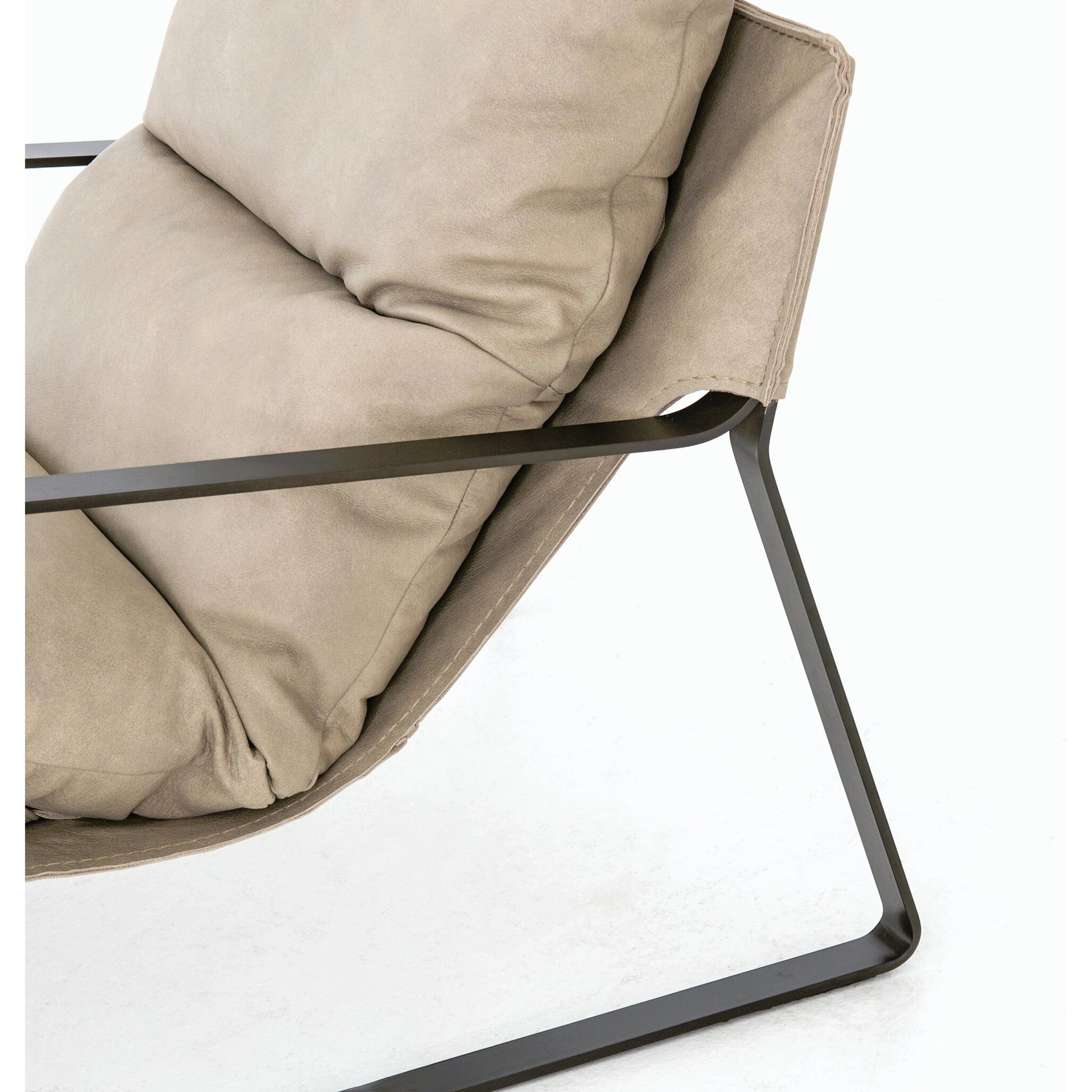 Emmett Sling Chair by Four Hands. Made from top grain leather, iron, 100% polyester in a modern style.