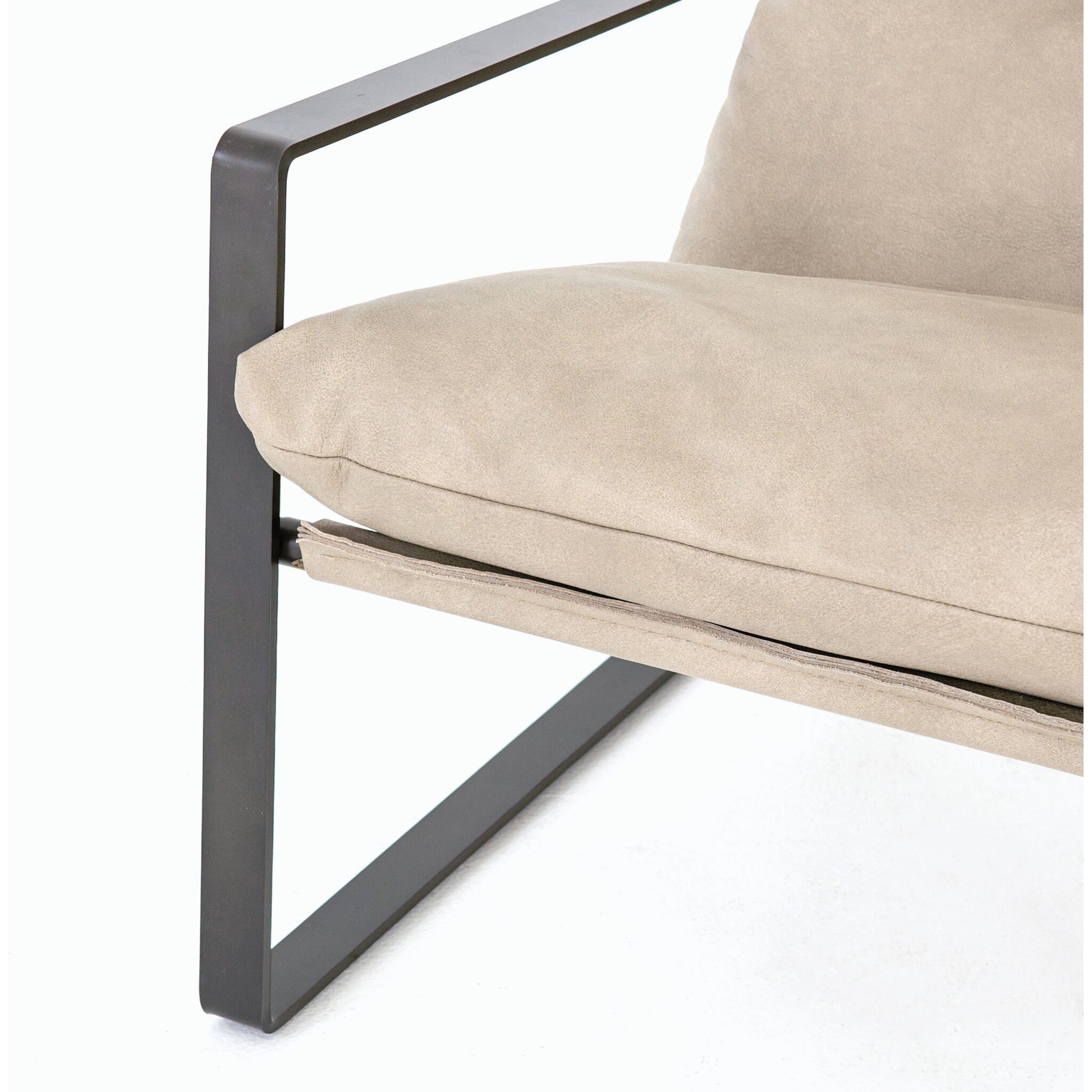 Emmett Sling Chair by Four Hands. Made from top grain leather, iron, 100% polyester in a modern style.