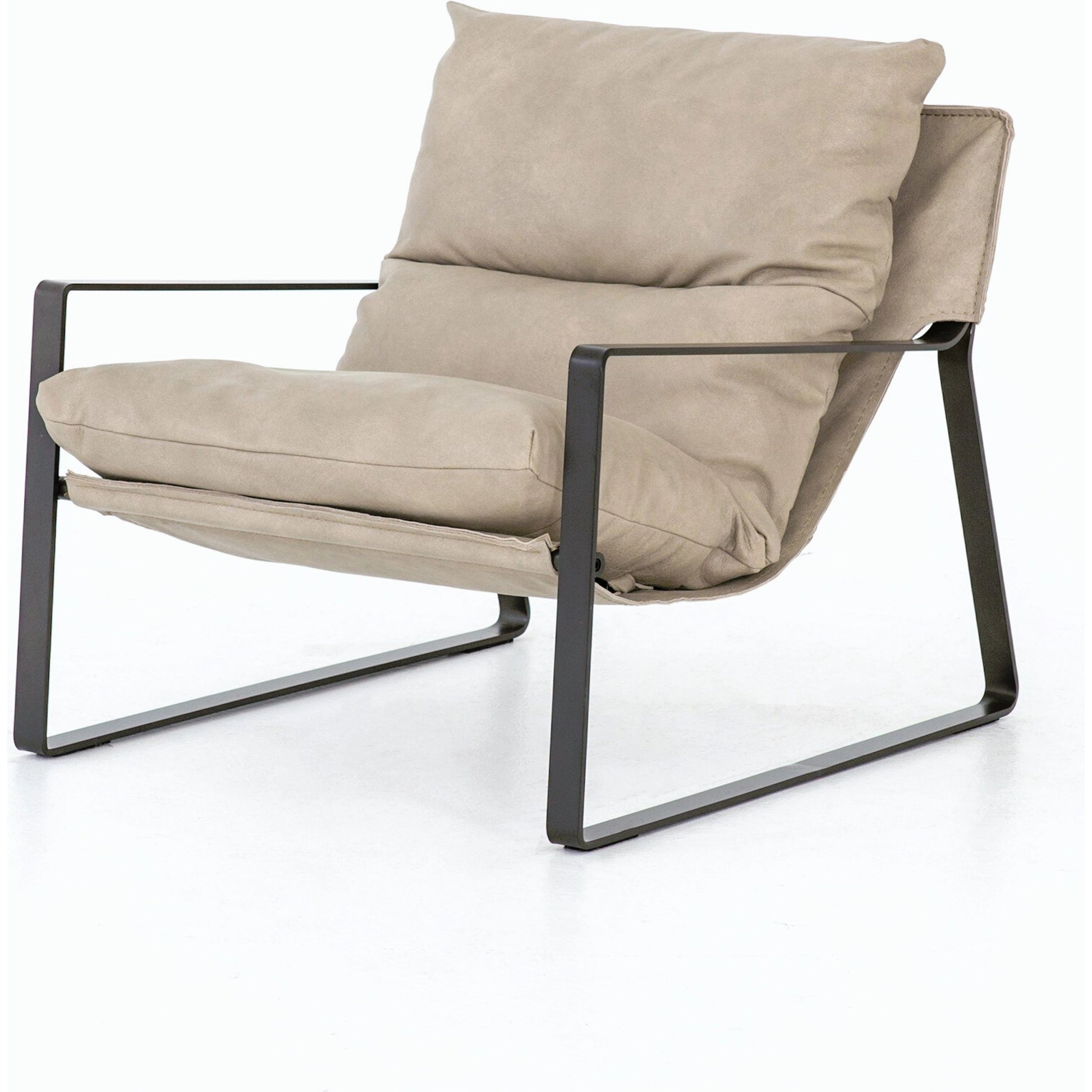 Emmett Sling Chair by Four Hands. Made from top grain leather, iron, 100% polyester in a modern style.