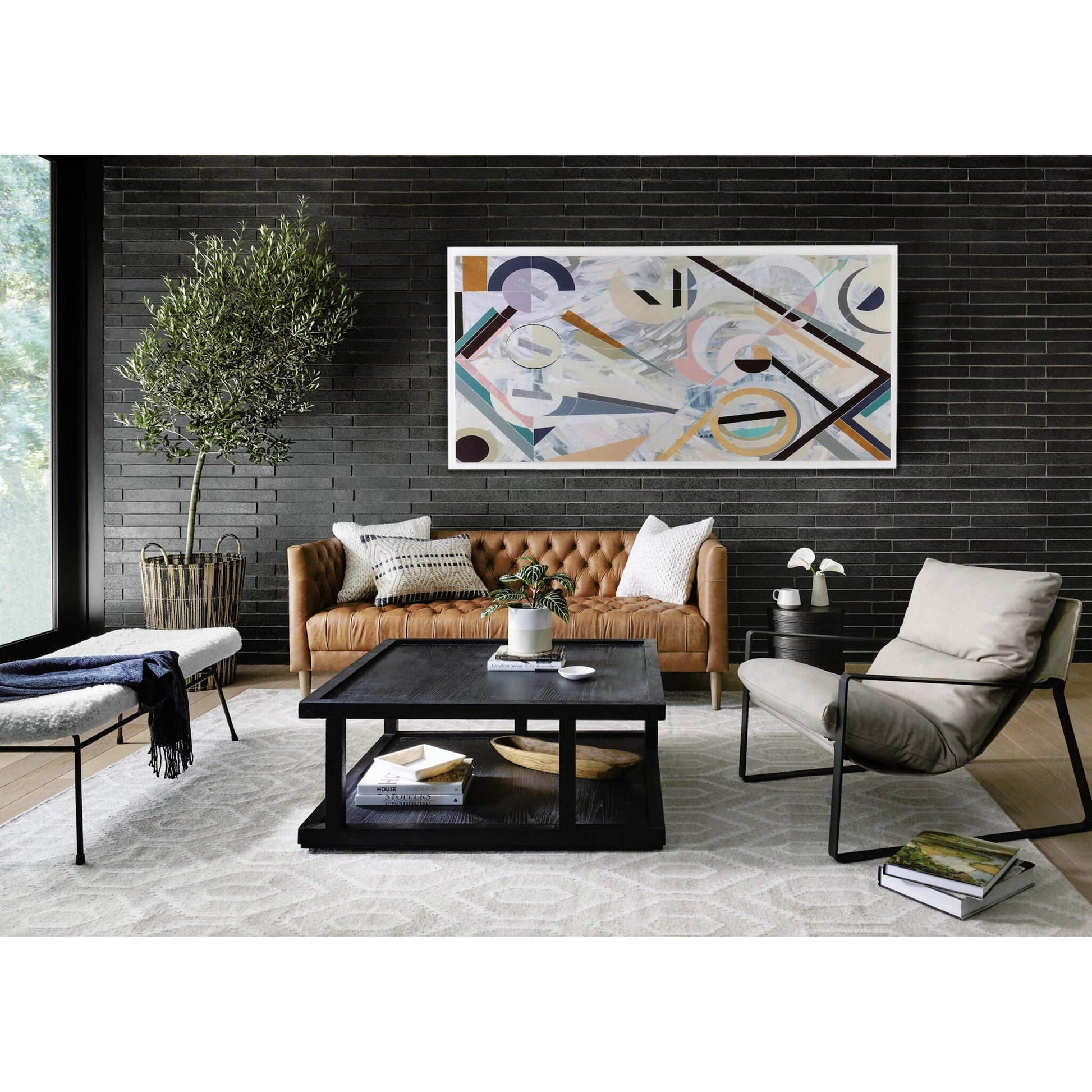 Emmett Sling Chair by Four Hands. Made from top grain leather, iron, 100% polyester in a modern style.