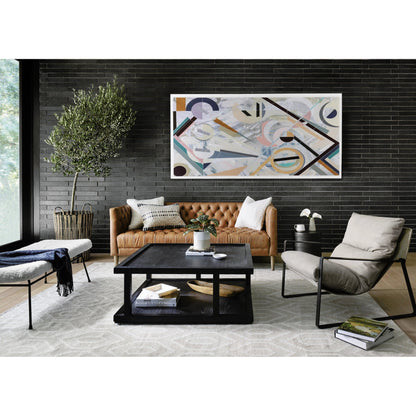 Emmett Sling Chair by Four Hands. Made from top grain leather, iron, 100% polyester in a modern style.