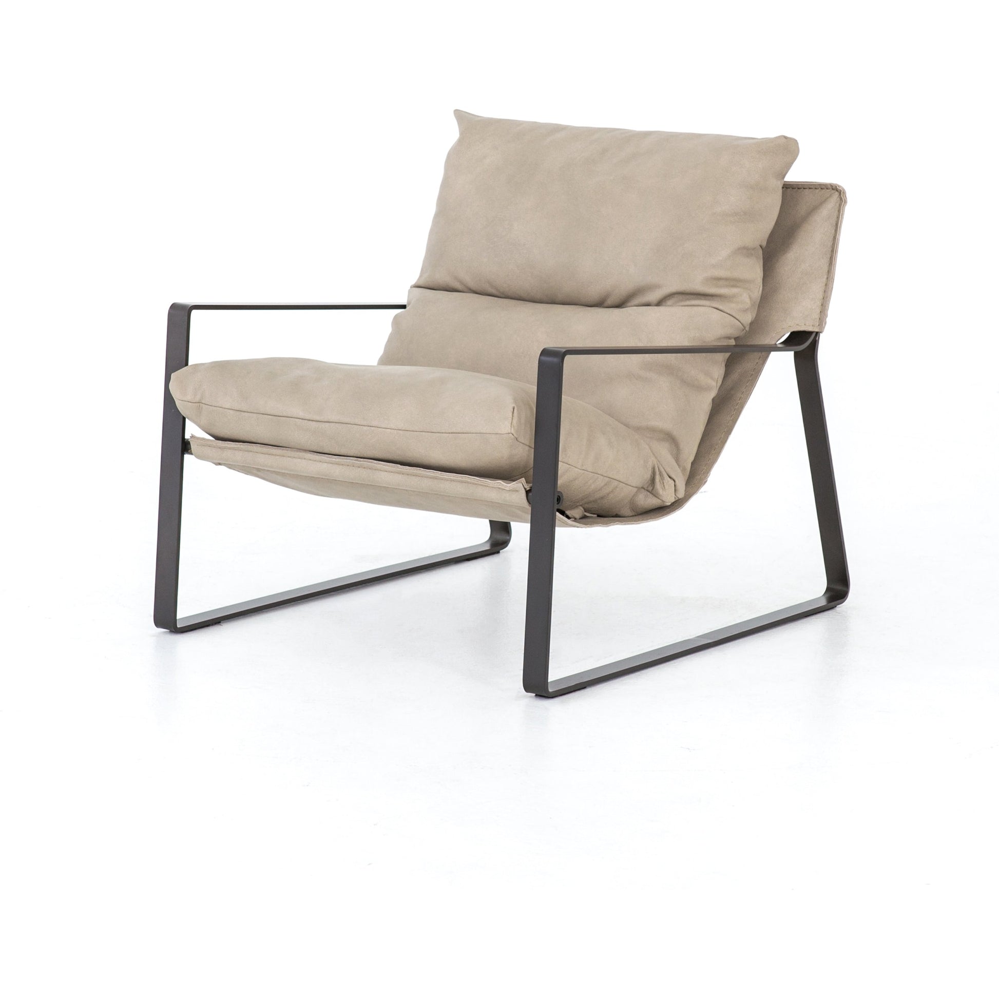 Emmett Sling Chair by Four Hands. Made from top grain leather, iron, 100% polyester in a modern style.