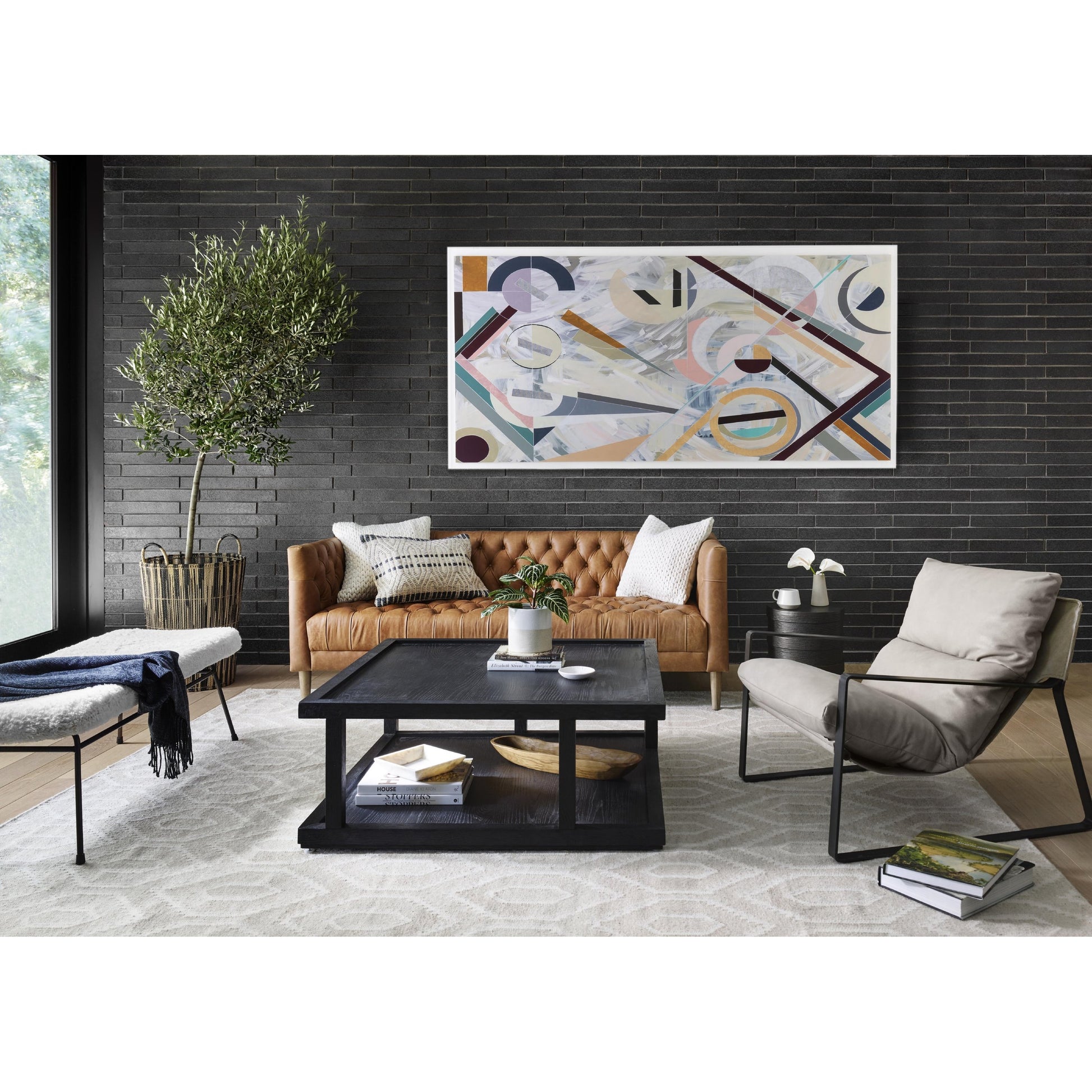 Emmett Sling Chair by Four Hands. Made from top grain leather, iron, 100% polyester in a modern style.