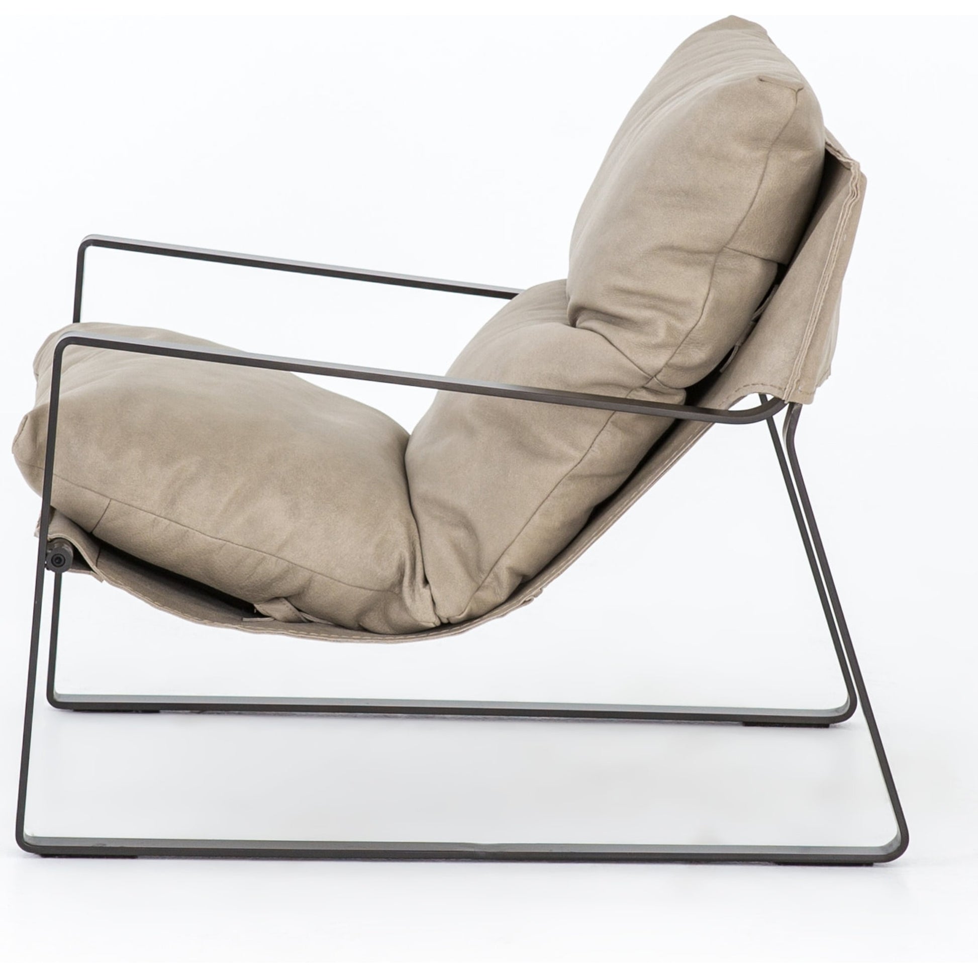 Emmett Sling Chair by Four Hands. Made from top grain leather, iron, 100% polyester in a modern style.