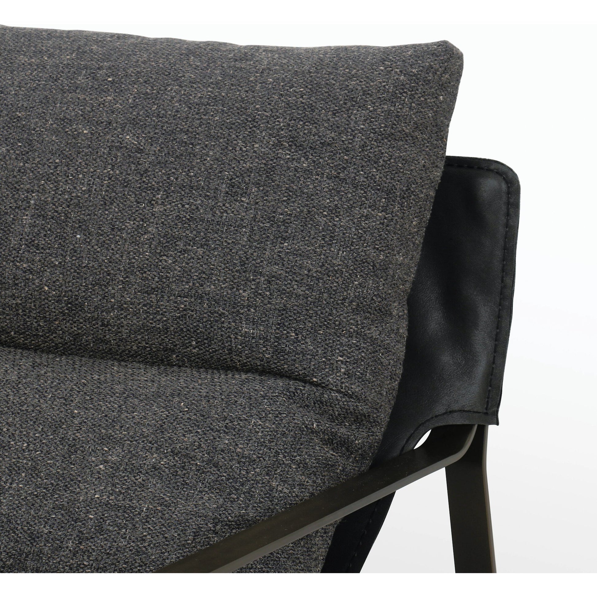 Emmett Sling Chair by Four Hands. Made from top grain leather, iron, 100% polyester in a modern style.