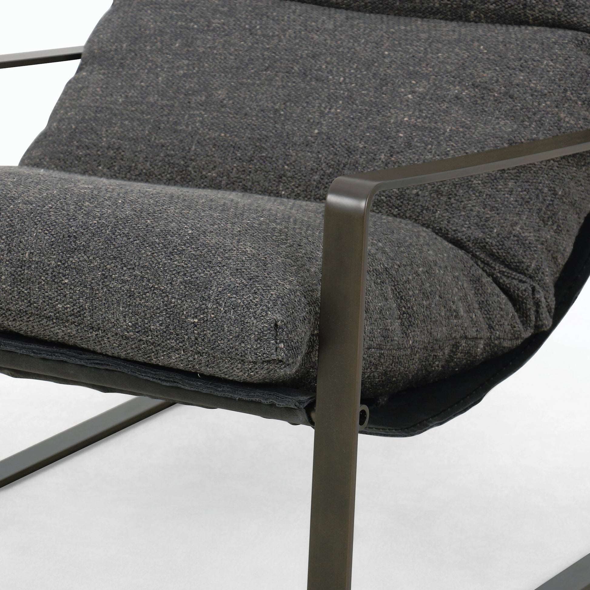 Emmett Sling Chair by Four Hands. Made from top grain leather, iron, 100% polyester in a modern style.