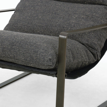 Emmett Sling Chair by Four Hands. Made from top grain leather, iron, 100% polyester in a modern style.