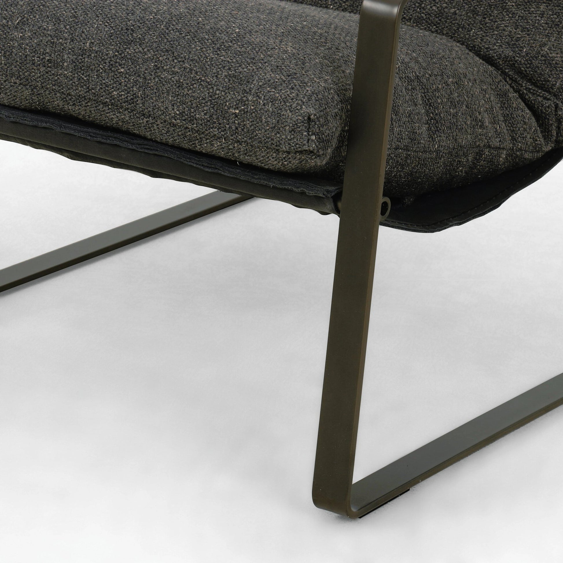 Emmett Sling Chair by Four Hands. Made from top grain leather, iron, 100% polyester in a modern style.
