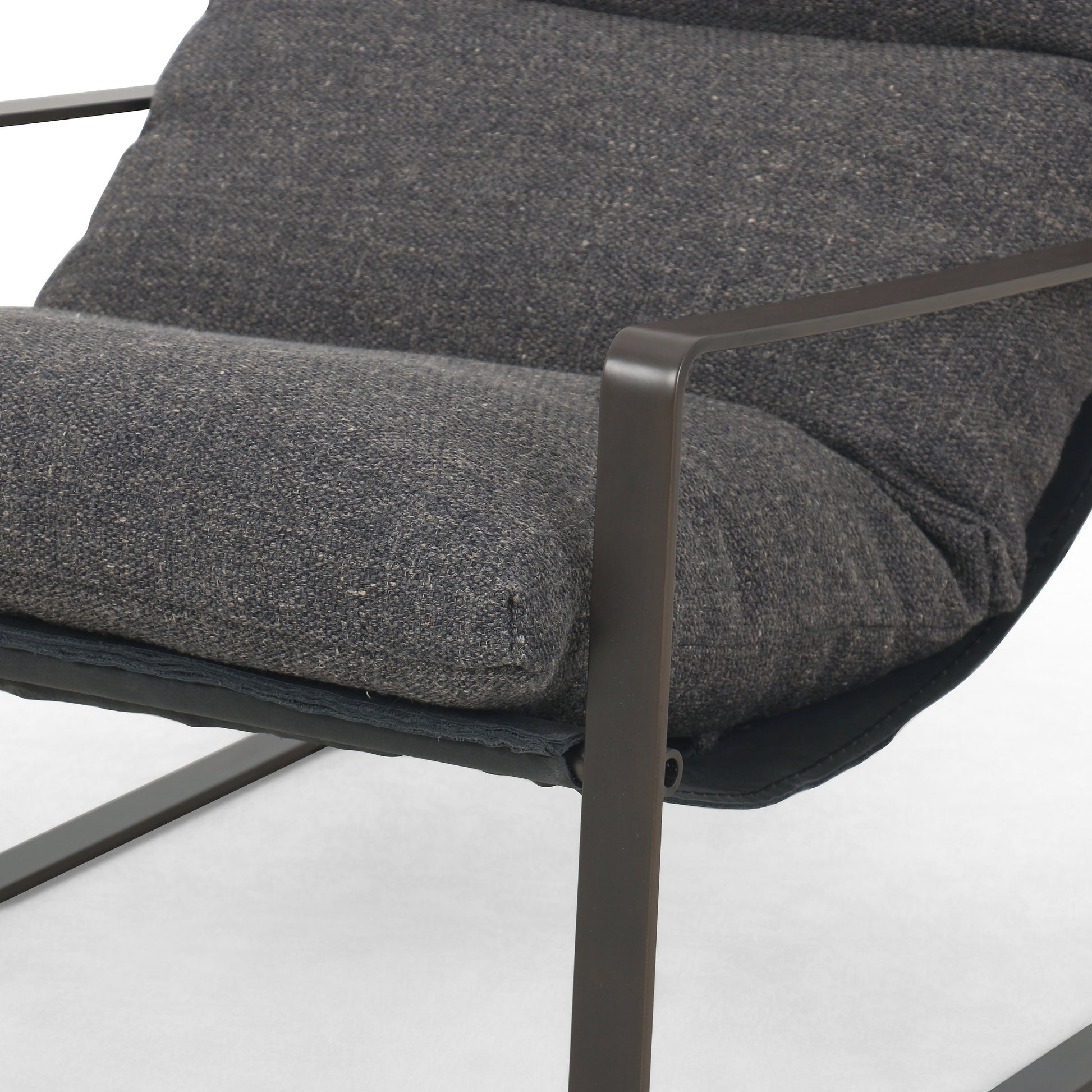 Emmett Sling Chair by Four Hands. Made from top grain leather, iron, 100% polyester in a modern style.