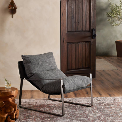 Emmett Sling Chair by Four Hands. Made from top grain leather, iron, 100% polyester in a modern style.