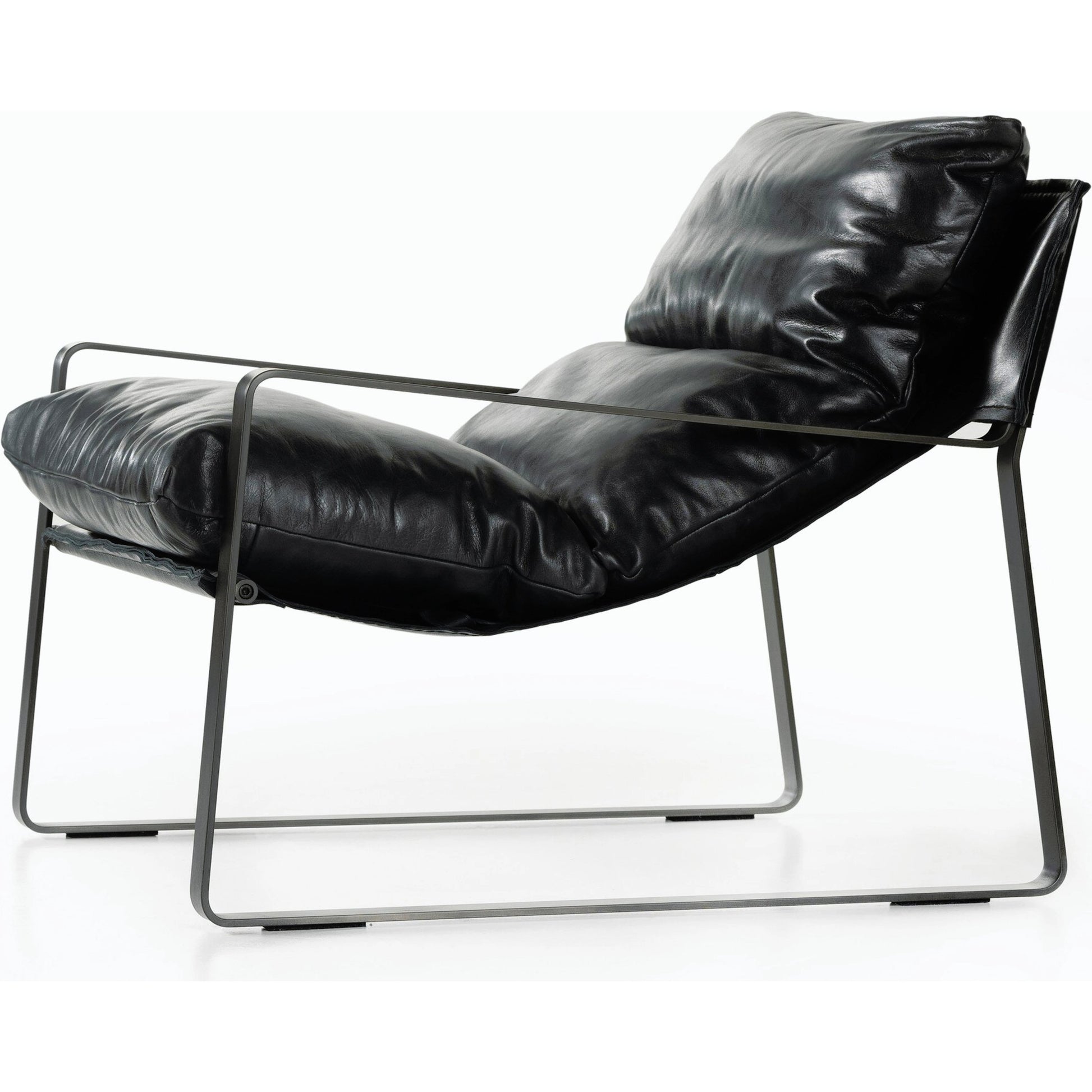 Emmett Sling Chair by Four Hands. Made from top grain leather, iron, 100% polyester in a modern style.