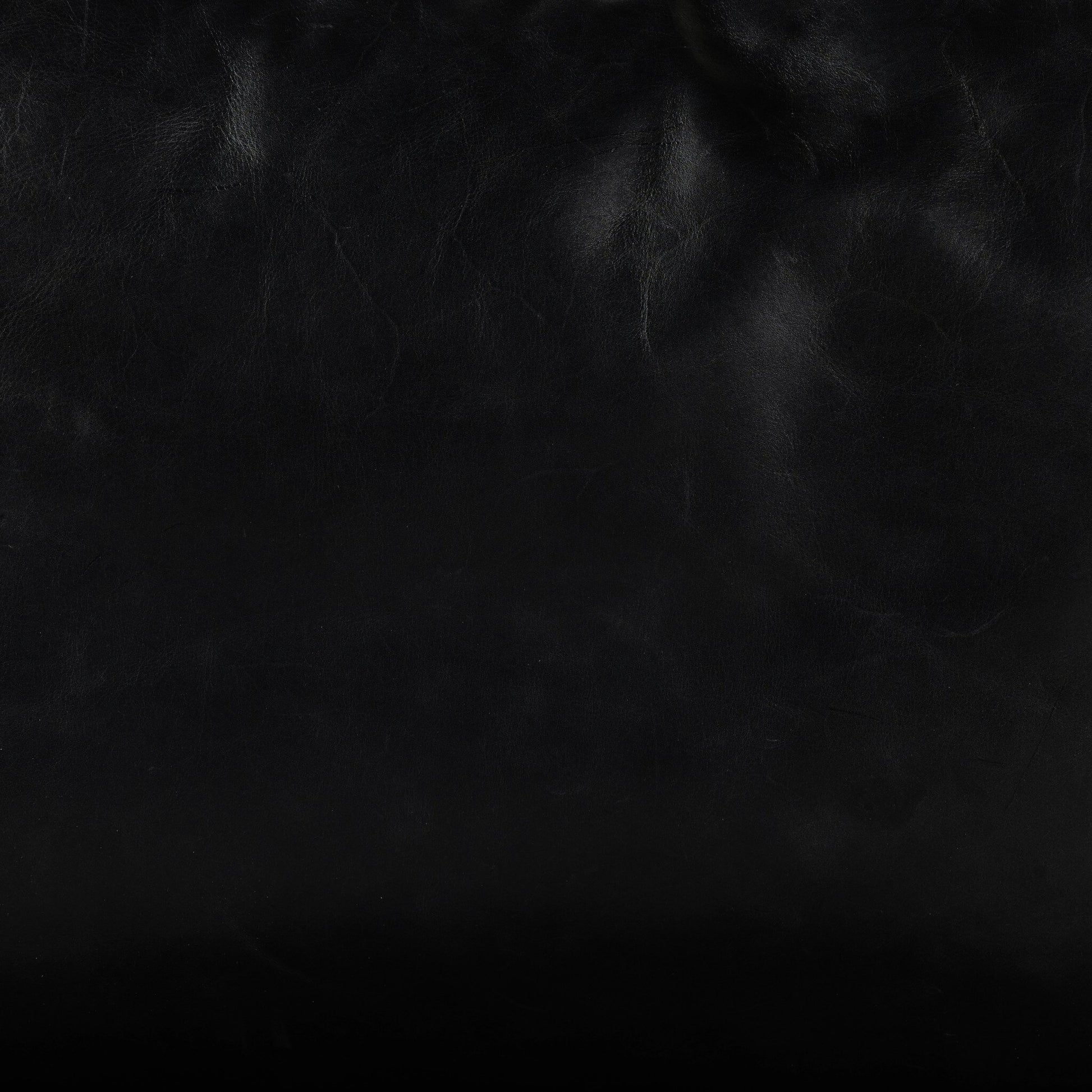 Emmett Sling Chair by Four Hands. Made from top grain leather, iron, 100% polyester in a modern style.