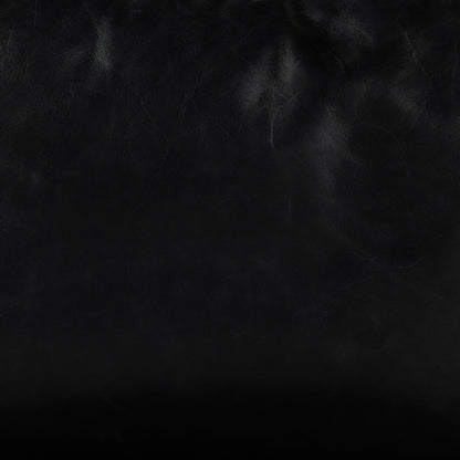 Emmett Sling Chair by Four Hands. Made from top grain leather, iron, 100% polyester in a modern style.