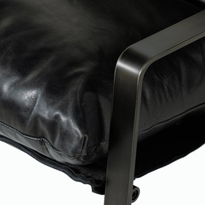 Emmett Sling Chair by Four Hands. Made from top grain leather, iron, 100% polyester in a modern style.