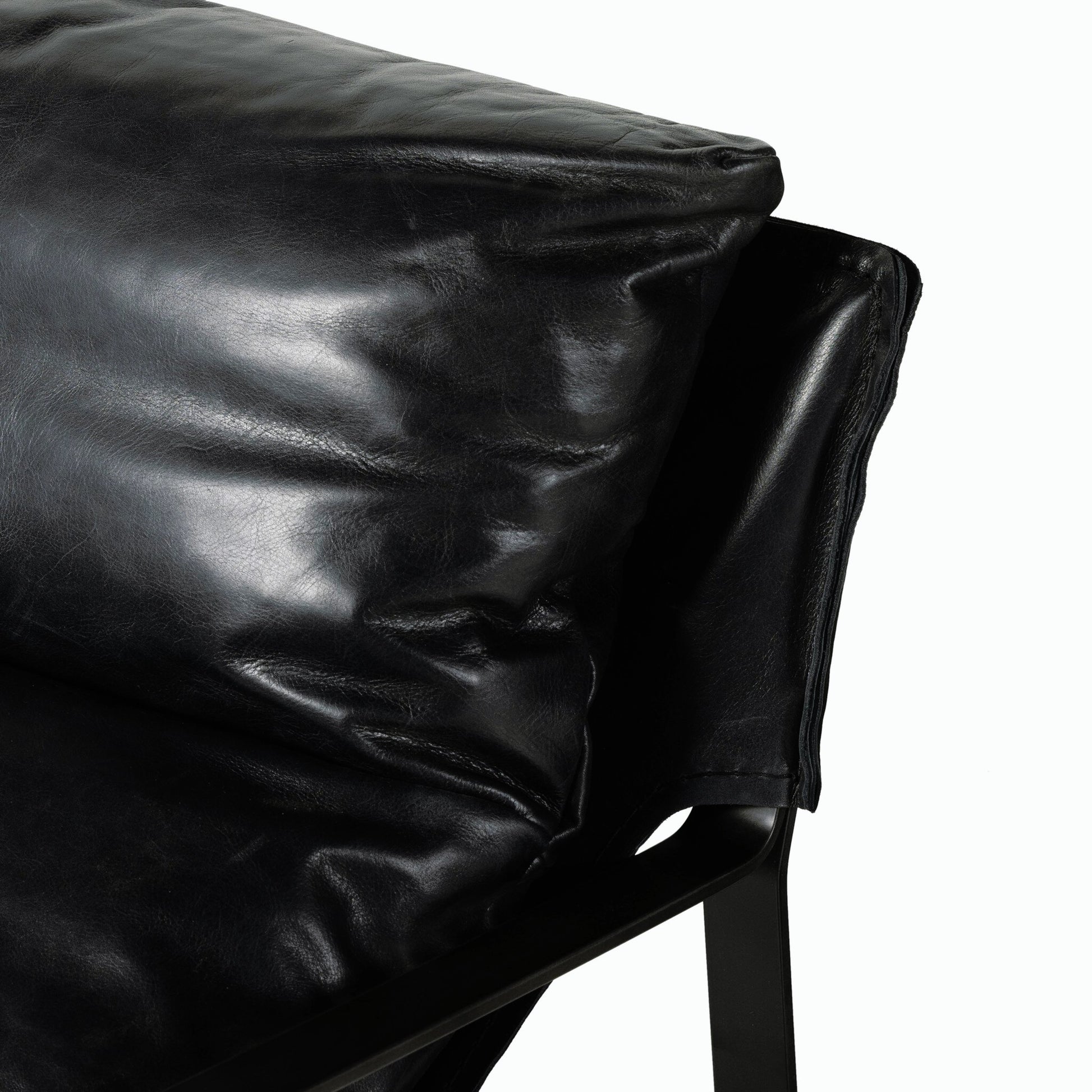 Emmett Sling Chair by Four Hands. Made from top grain leather, iron, 100% polyester in a modern style.