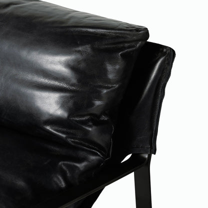 Emmett Sling Chair by Four Hands. Made from top grain leather, iron, 100% polyester in a modern style.