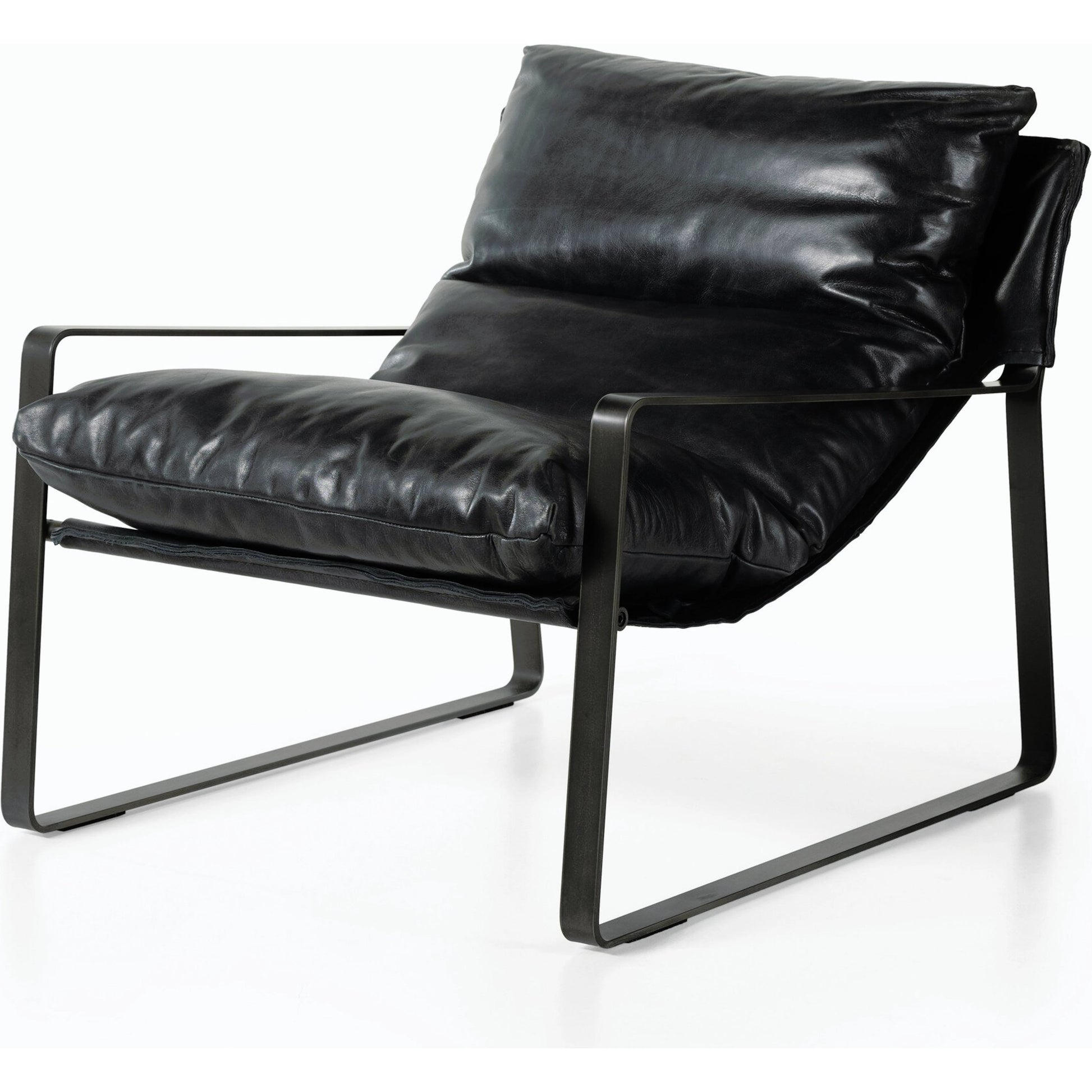 Emmett Sling Chair by Four Hands. Made from top grain leather, iron, 100% polyester in a modern style.