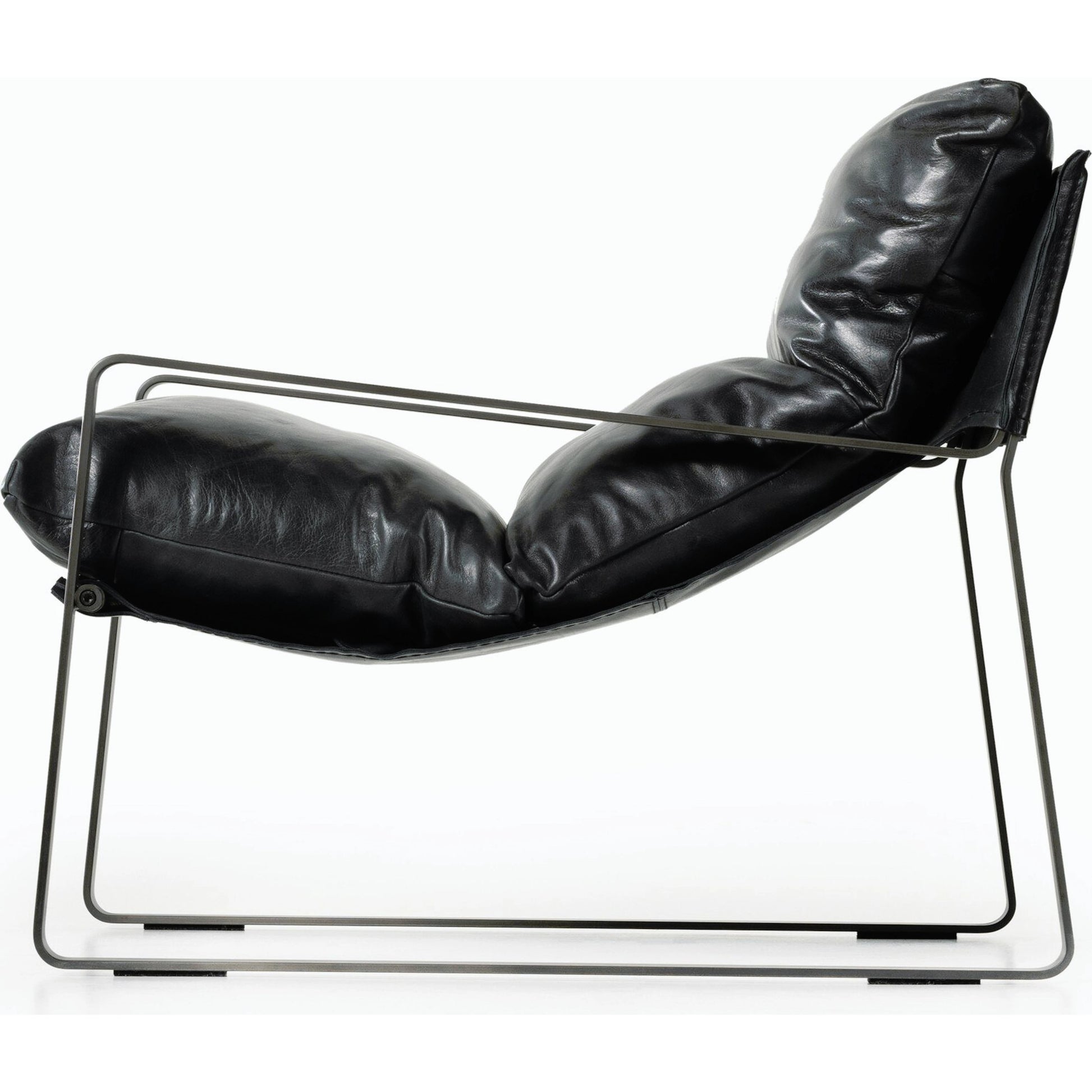 Emmett Sling Chair by Four Hands. Made from top grain leather, iron, 100% polyester in a modern style.