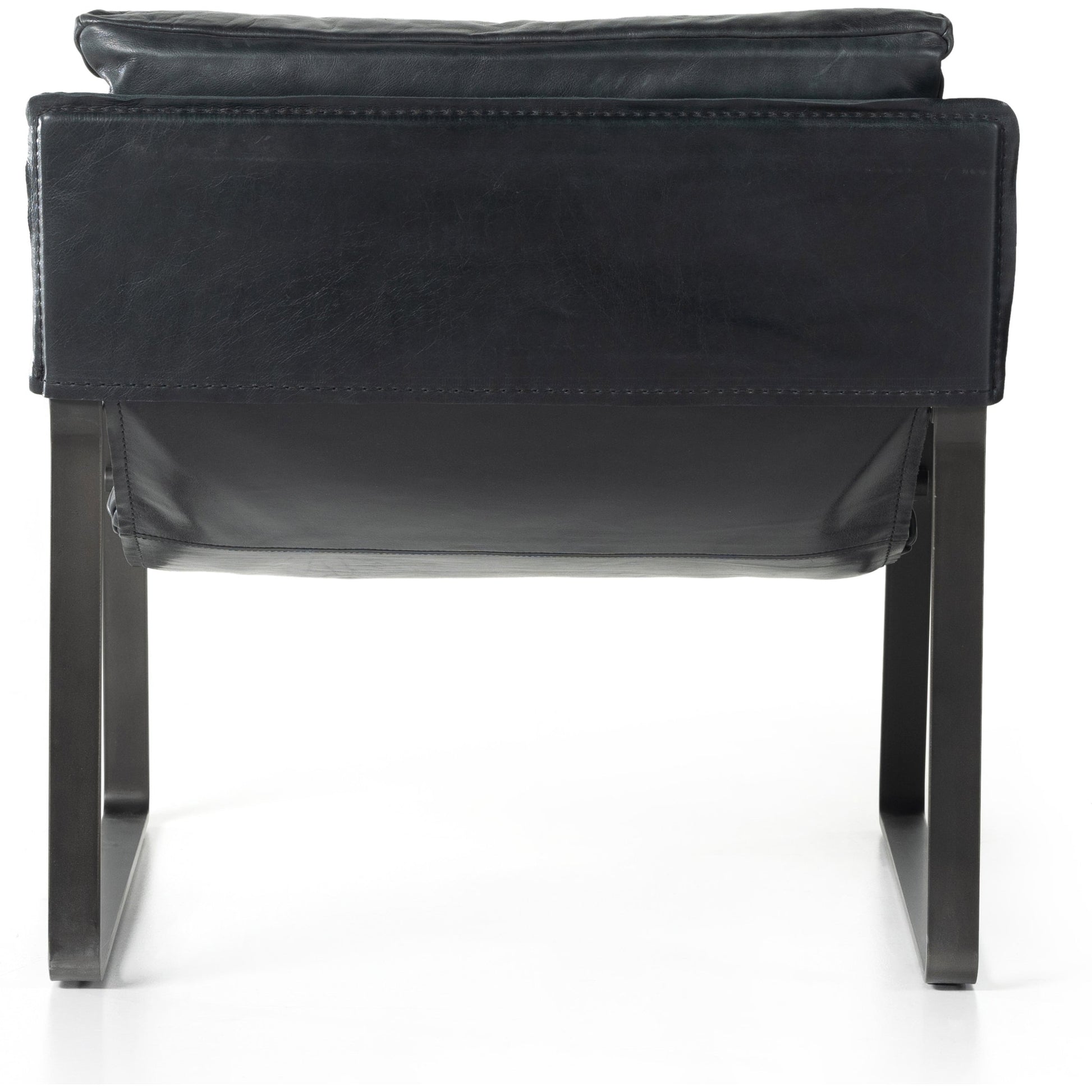 Emmett Sling Chair by Four Hands. Made from top grain leather, iron, 100% polyester in a modern style.