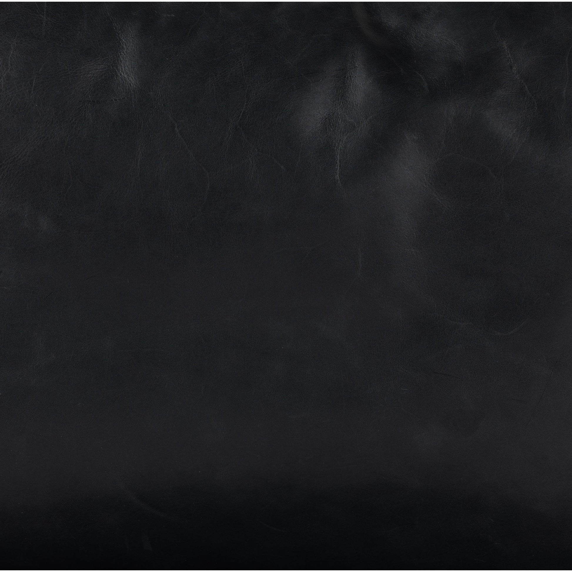 Emmett Sling Chair by Four Hands. Made from top grain leather, iron, 100% polyester in a modern style.