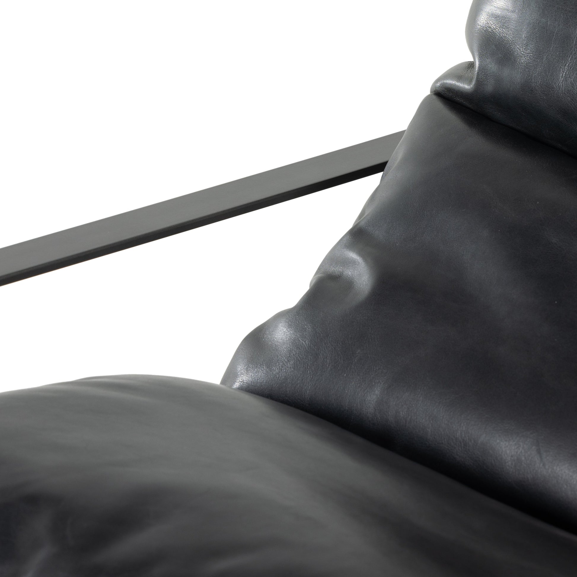 Emmett Sling Chair by Four Hands. Made from top grain leather, iron, 100% polyester in a modern style.