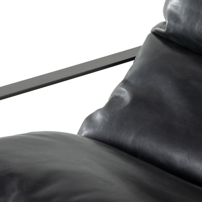 Emmett Sling Chair by Four Hands. Made from top grain leather, iron, 100% polyester in a modern style.