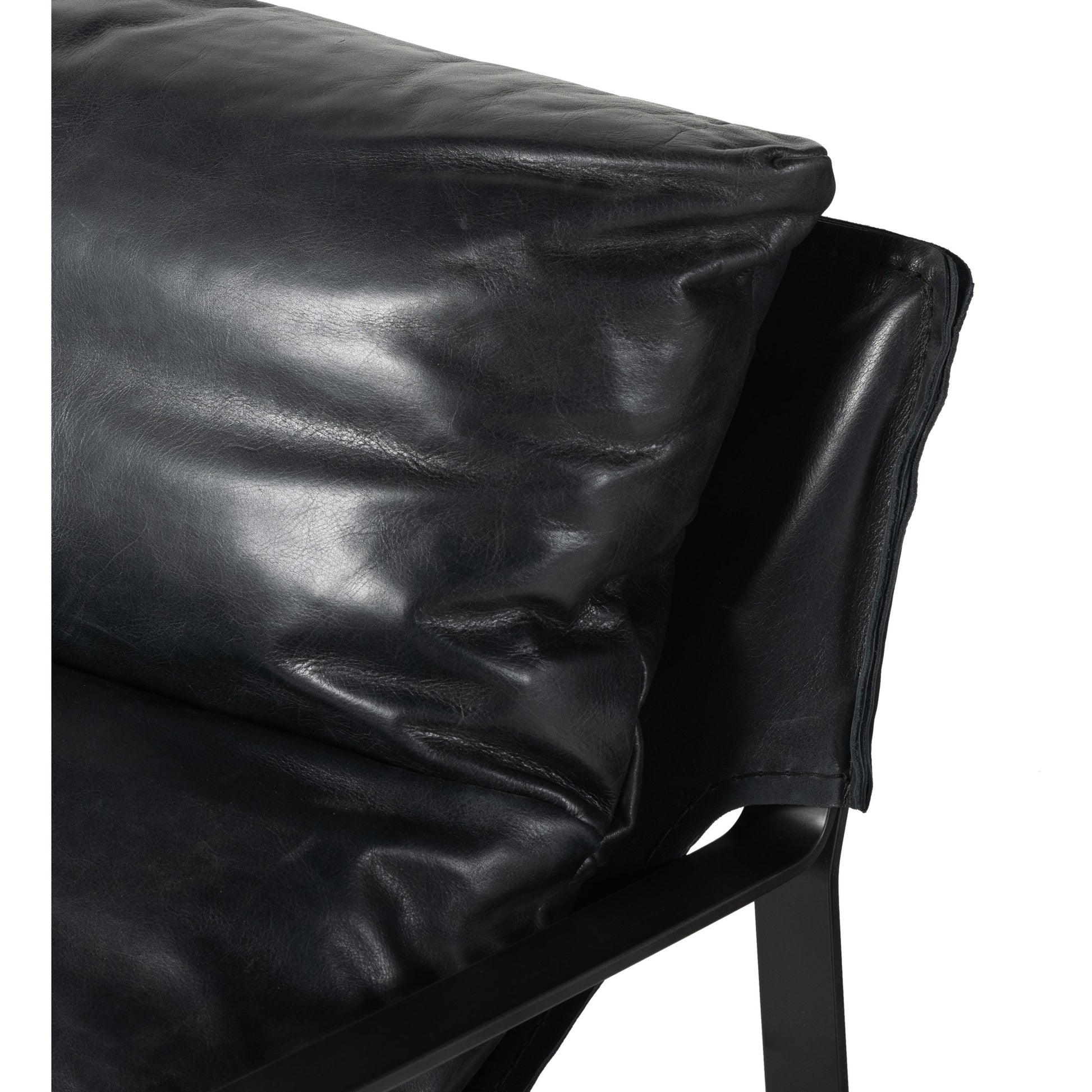 Emmett Sling Chair by Four Hands. Made from top grain leather, iron, 100% polyester in a modern style.