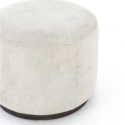 Sinclair Round Ottoman by Four Hands. Made from unique in a modern style.