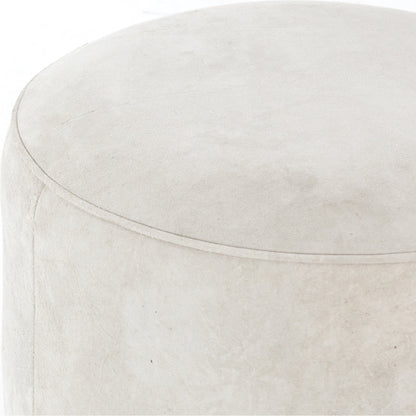 Sinclair Round Ottoman by Four Hands. Made from unique in a modern style.