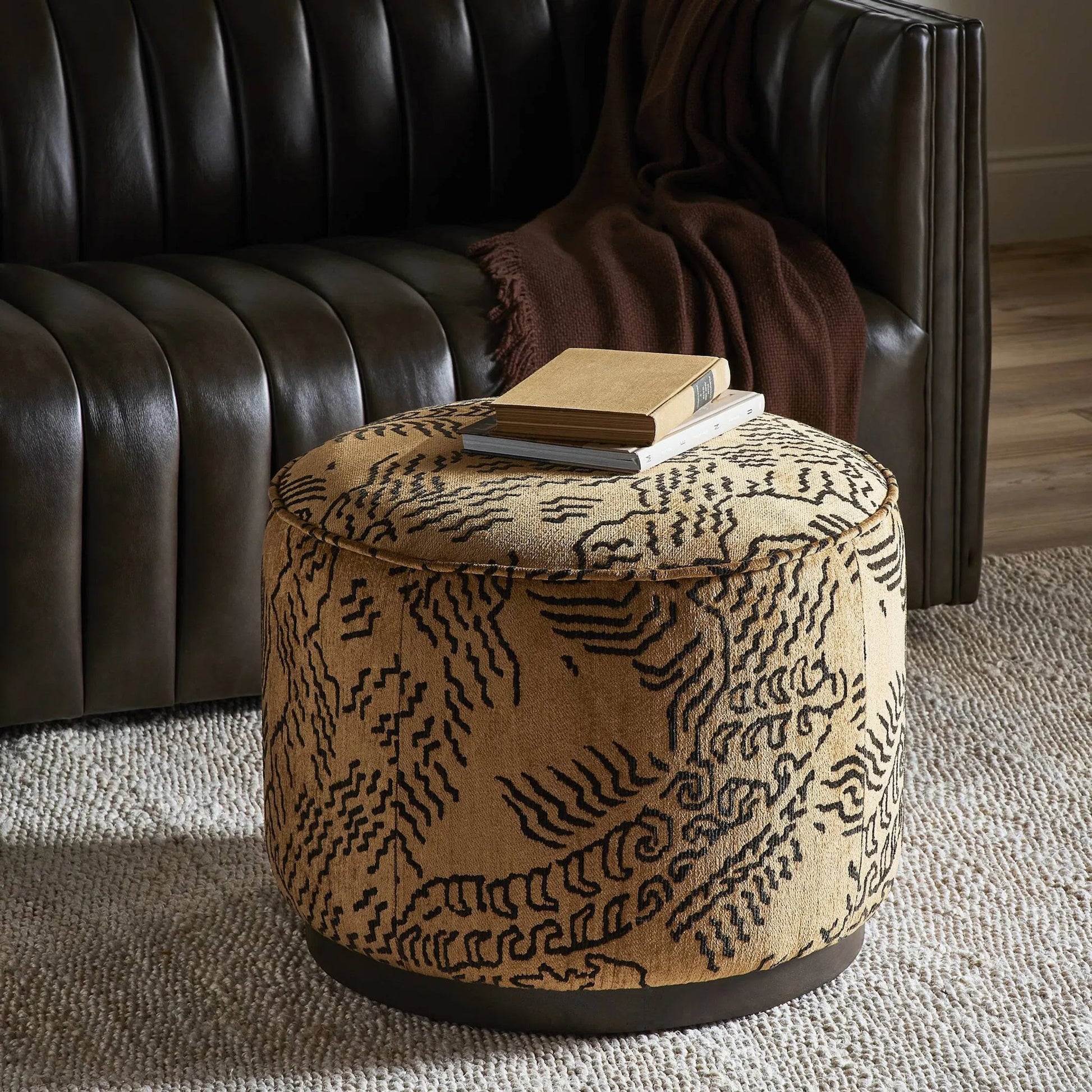 Sinclair Round Ottoman by Four Hands. Made from unique in a modern style.