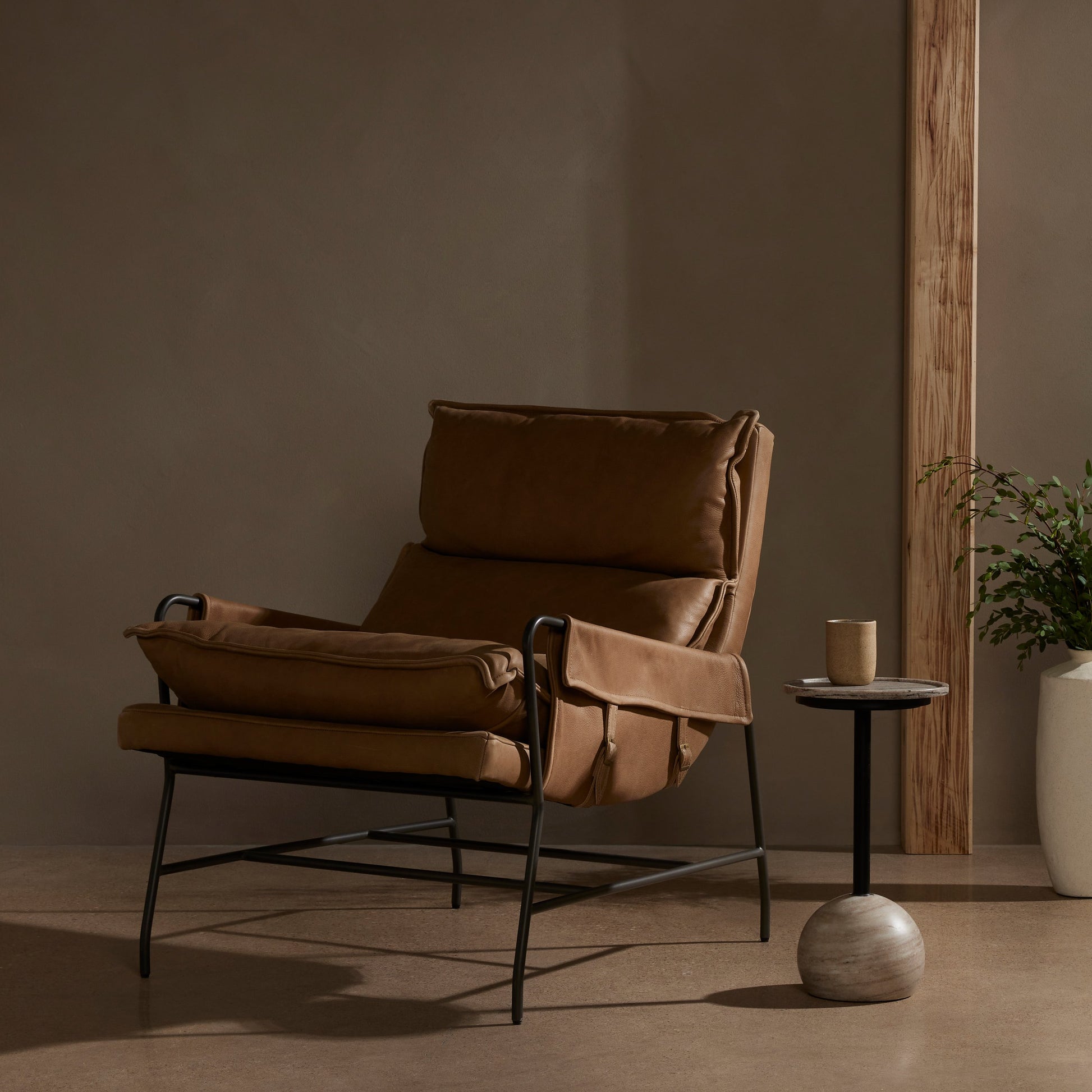 Taryn Chair by Four Hands. Made from top grain leather, iron, 100% polyester in a modern style.